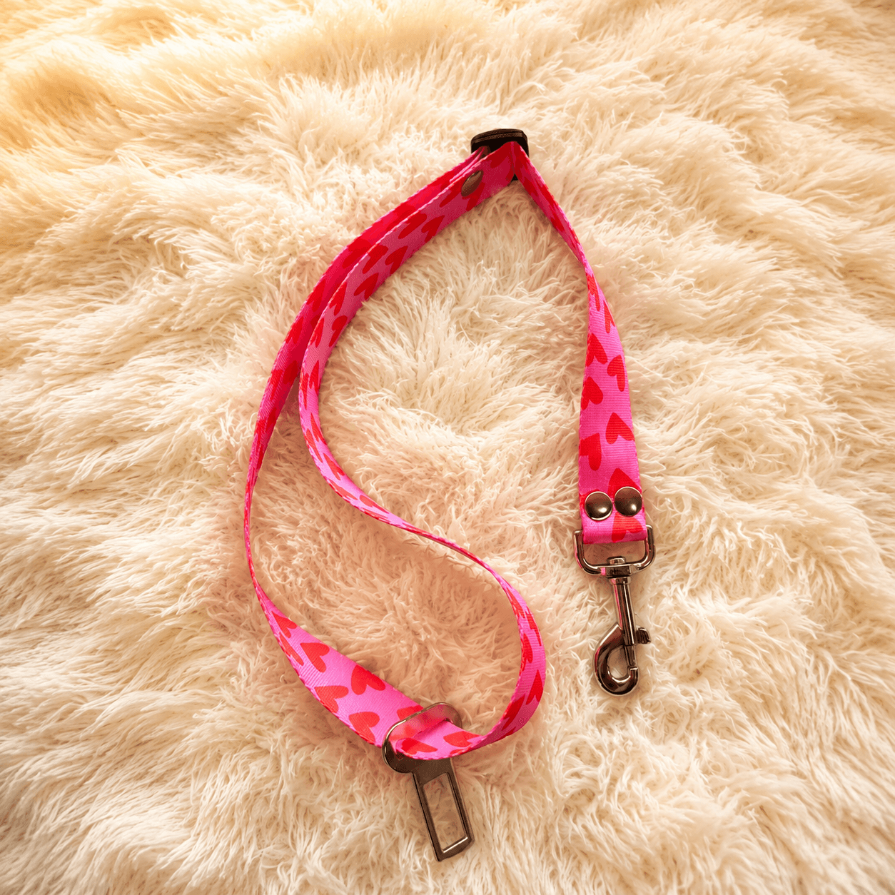 cinturon de seguridad de auto para perro rosa
